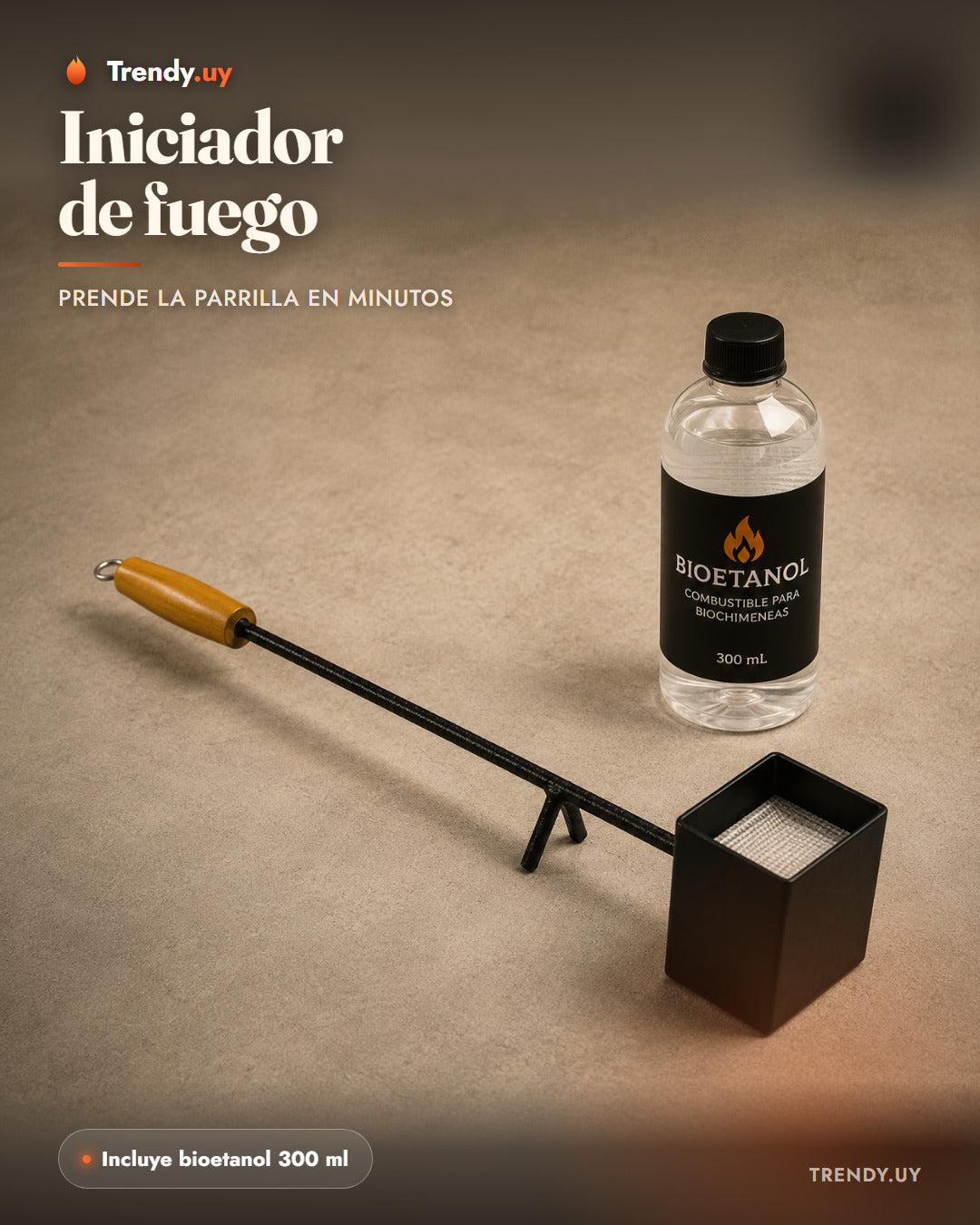 Iniciador de fuego con mango de madera y bioetanol 300 ml incluido, sobre fondo de cemento